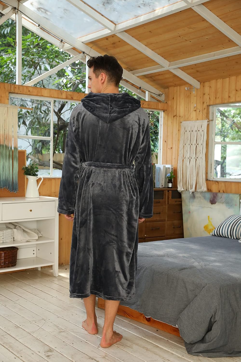 Men's black ultra-soft hooded bathrobe, perfect for chilly weather.