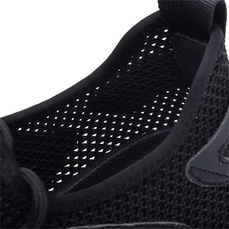 Modern design men's ultralight steel toe safety shoes. Stylish yet protective for active workers.