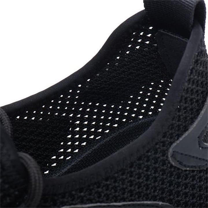 Modern design men's ultralight steel toe safety shoes. Stylish yet protective for active workers.