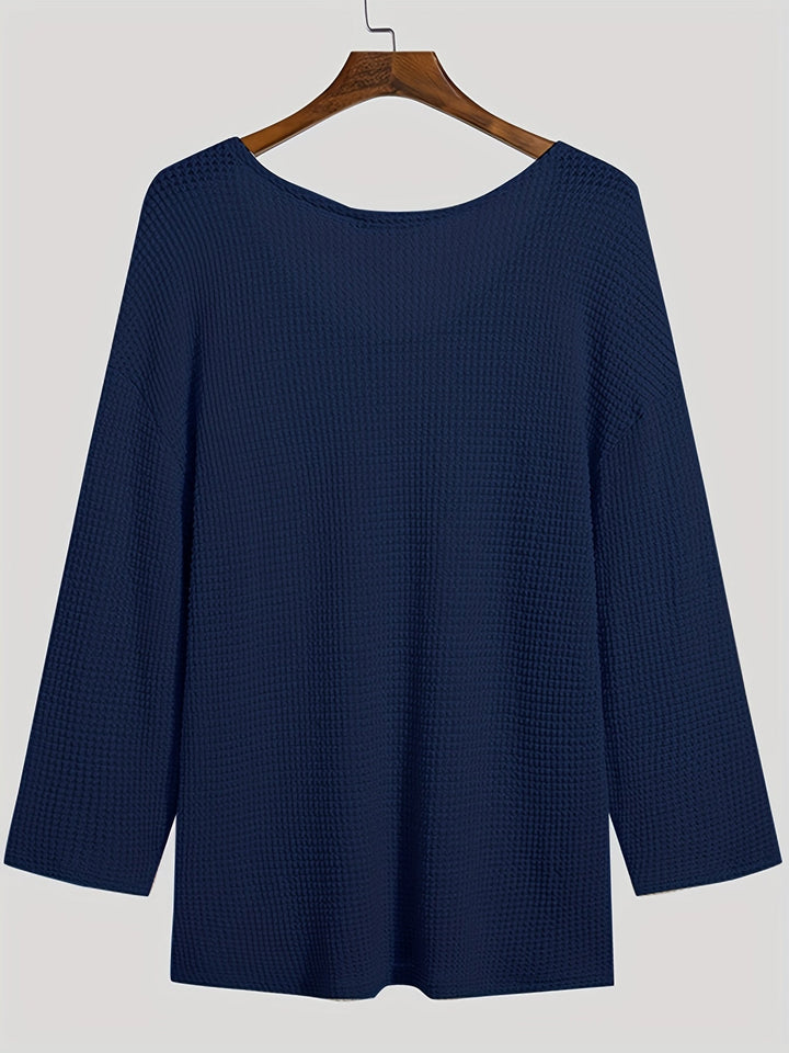 Modern men's V-neck knitted top with long sleeves, merging comfort with contemporary style.