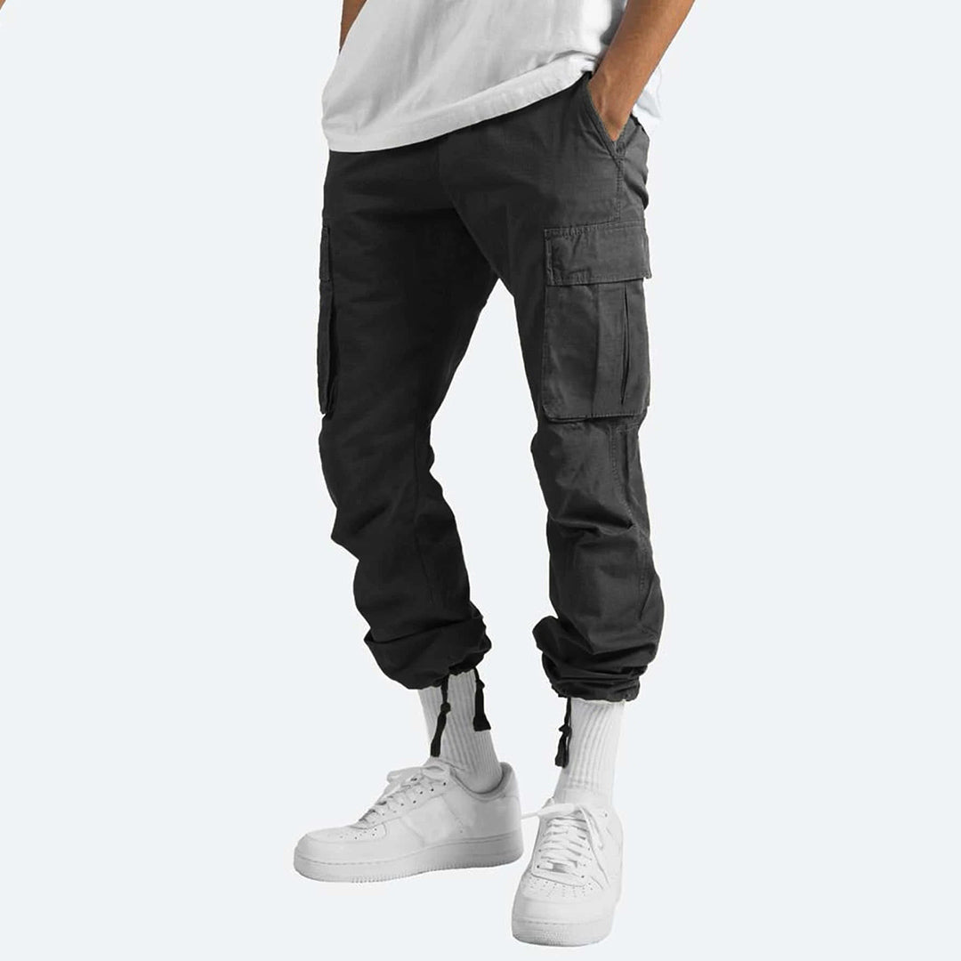 Casual men's utility pants, Graham model, with multiple practical pockets for outdoors.