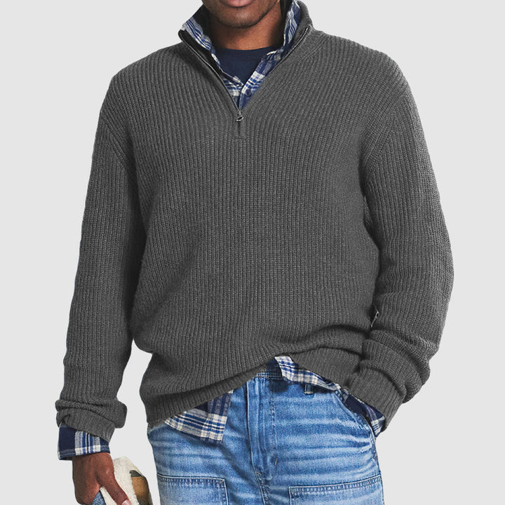 High-quality men's zip neck sweater in a versatile solid color, perfect for sophisticated business casual style.