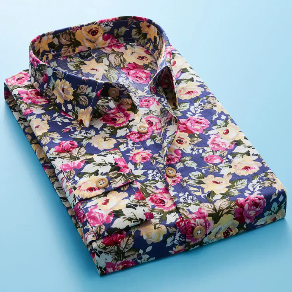 Men's vibrant short sleeve floral print shirt styled for a relaxed summer vacation or beach outfit.