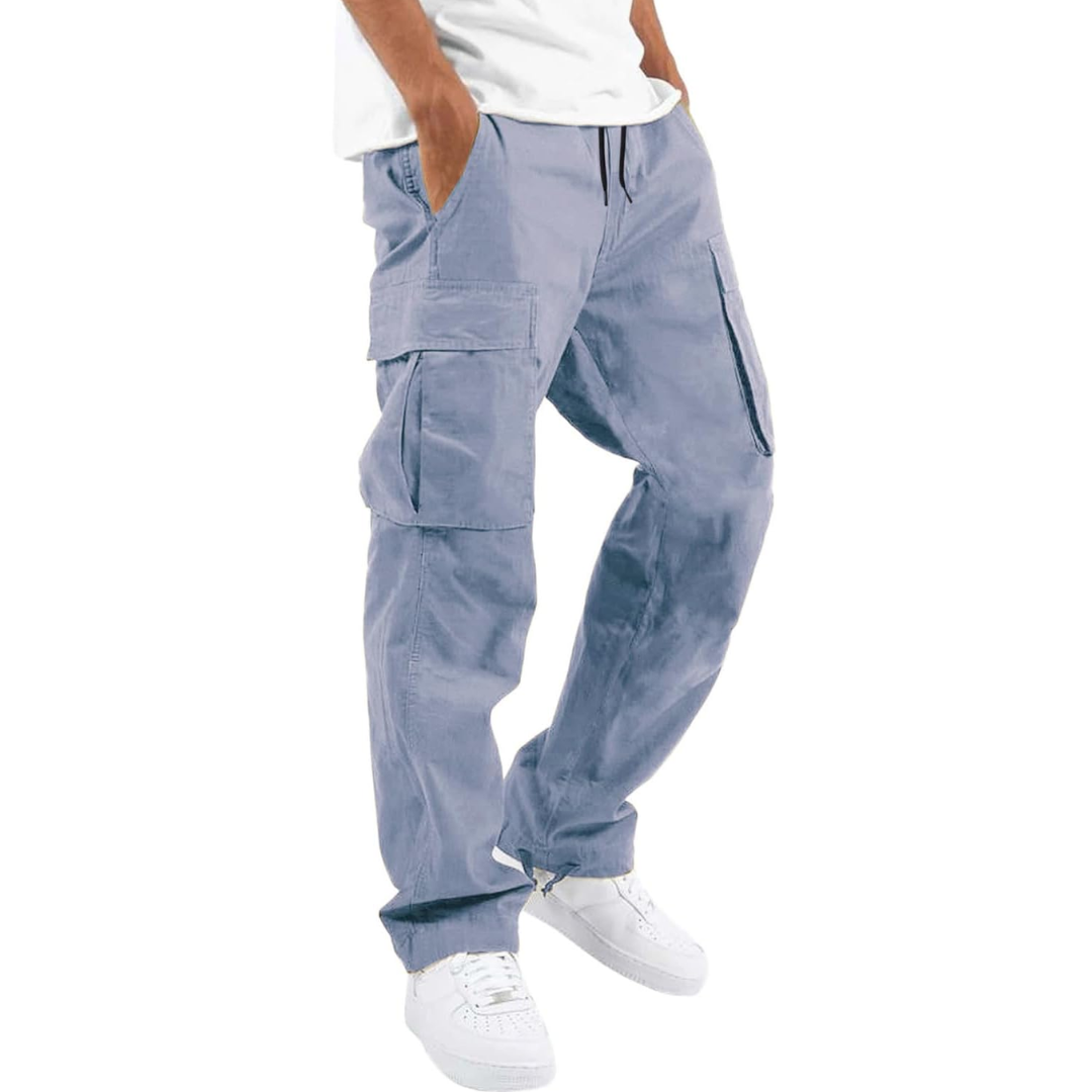 Model wearing Vincent men's loose fit cotton cargo joggers in a casual pose.