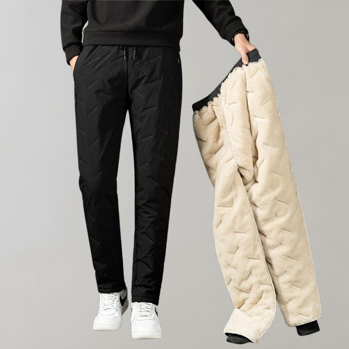 Men's warm & comfortable black winter trousers, perfect for cold weather outdoor wear.