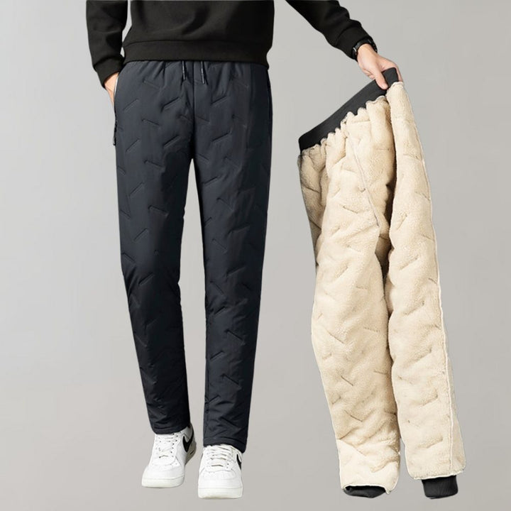 Comfortable men's winter trousers in black, offering warmth and durability for cold weather.