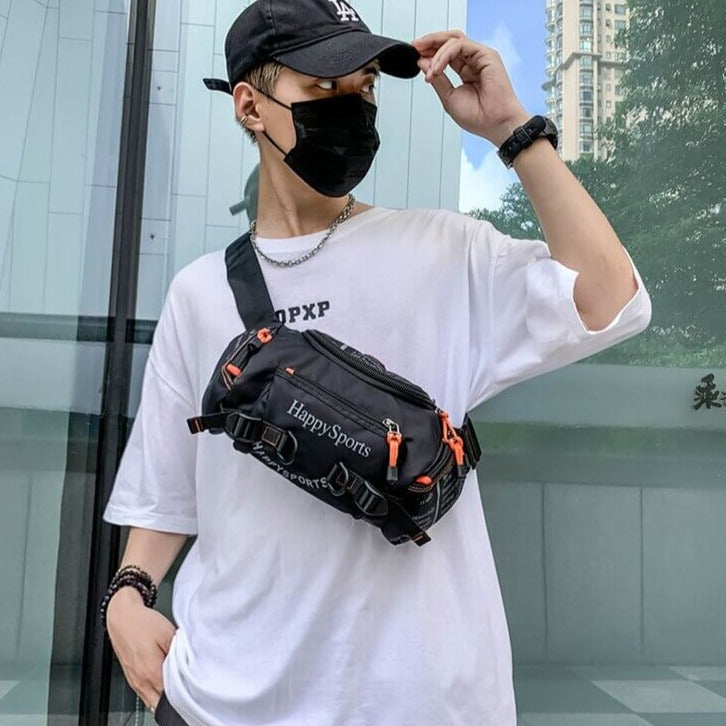 Durable water-resistant men's waist bag with robust zipper closure, securing valuables outdoors.