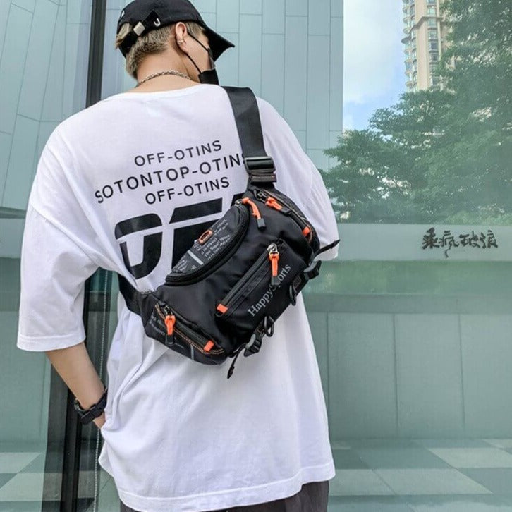Men's water-resistant cross-body travel pack, secure and comfortable for active use.