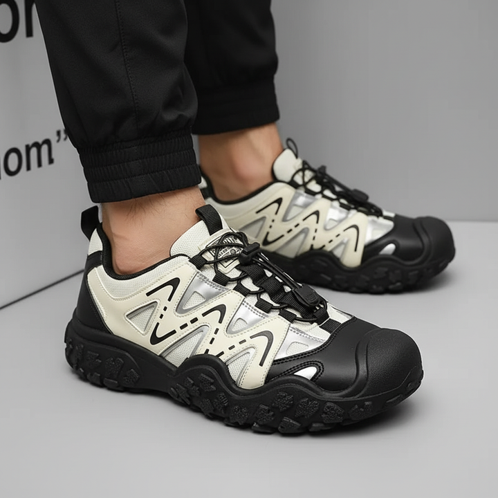 Man wearing Men's Xavier waterproof hiking shoes, walking on a rocky outdoor trail, comfort focus