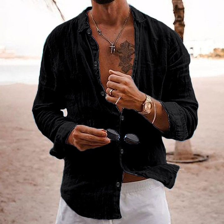 Detailed view of the collar and buttons on a mens breathable long-sleeve cotton shirt, suitable for summer.
