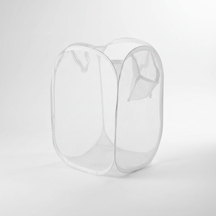 Two MeshCarry collapsible laundry hampers stacked when folded, showing efficient storage solutions.