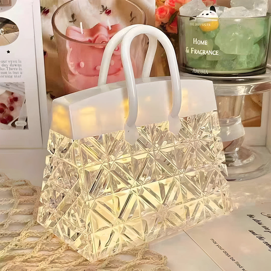 Stylish handbag-inspired decorative table lamp, offering soft LED mood lighting for contemporary homes