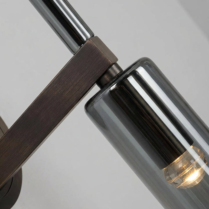 Modern smoked glass wall light with a hardwired black mount, perfect for indoor LED home lighting