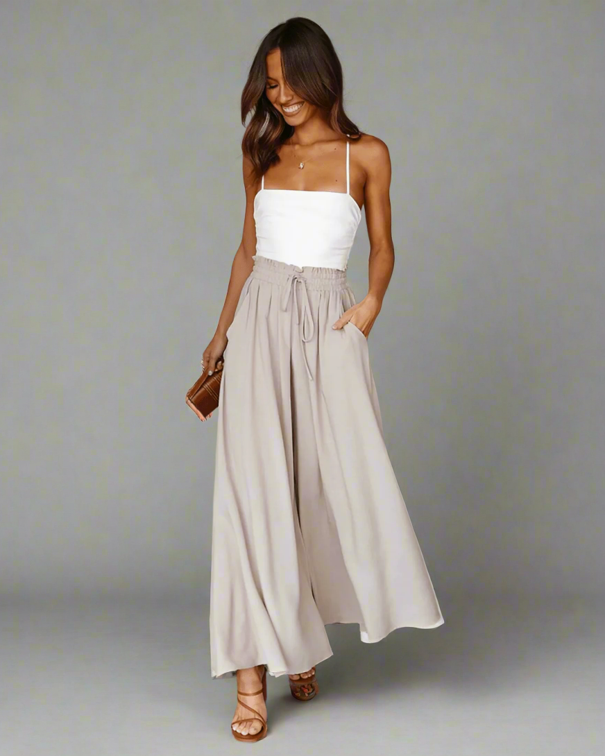 Close-up of the drawstring and high waist detail on Mira lightweight women's summer trousers.