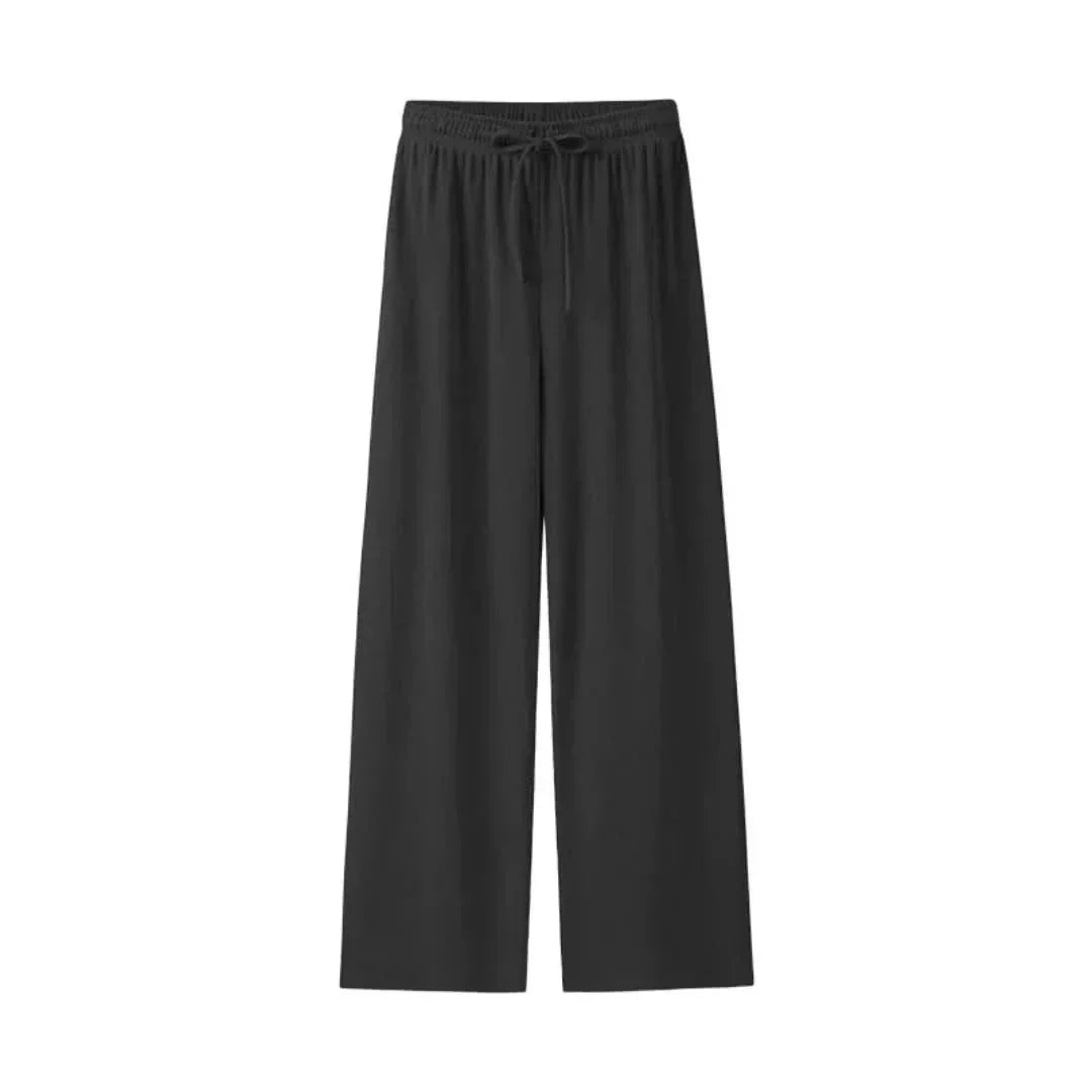 Summer-ready women's Mira linen trousers, designed for comfort and lightness, featuring an elastic waistband.