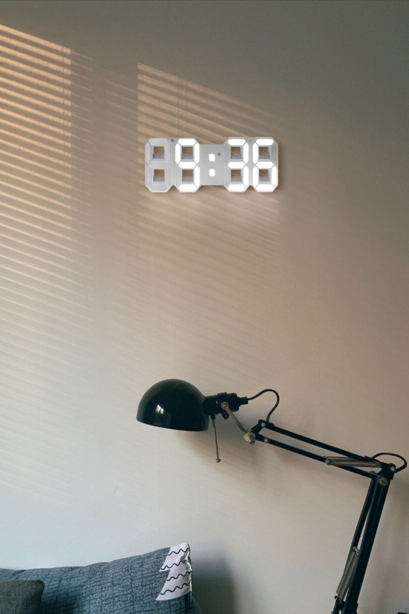 Stylish digital wall clock, 3D LED display & dimmable feature for accent lighting in any space.