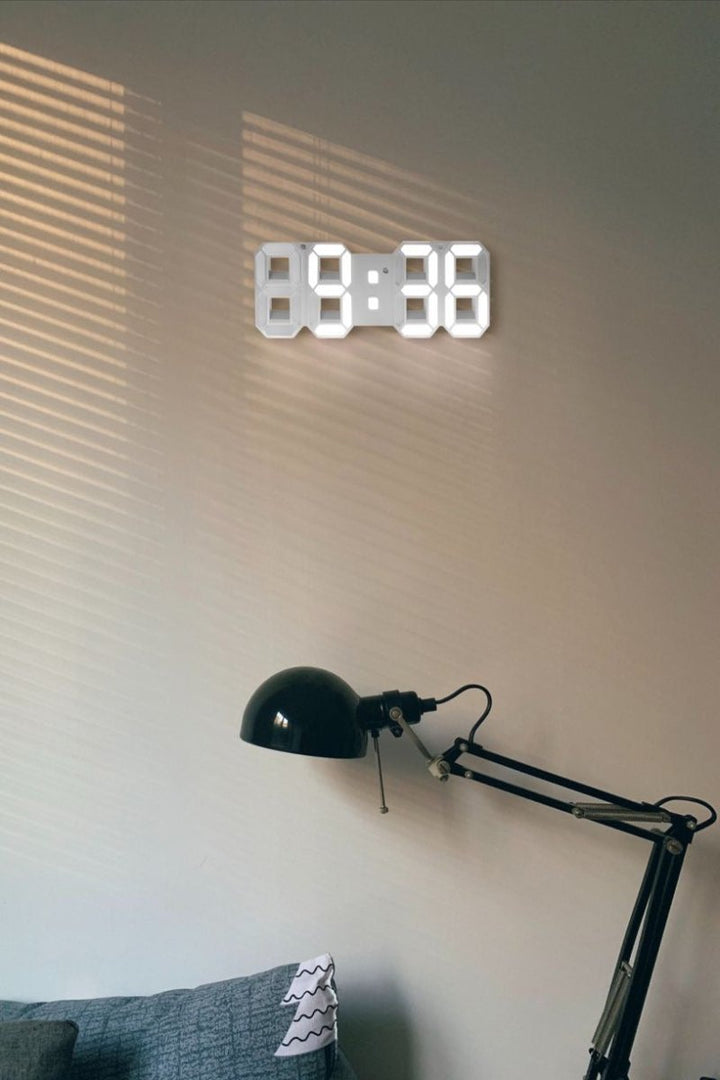 Stylish digital wall clock, 3D LED display & dimmable feature for accent lighting in any space.