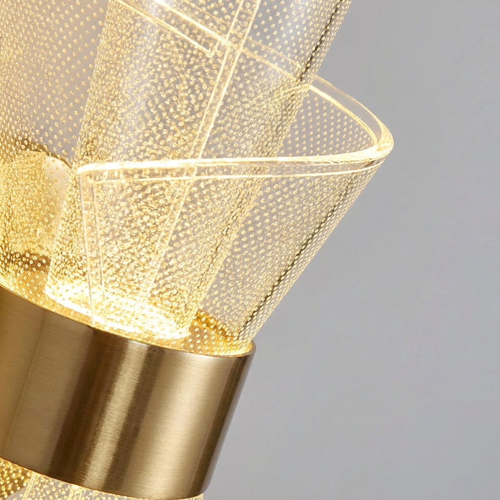 Energy-efficient modern LED wall sconce, Aurellis, featuring a minimalist design in clear acrylic