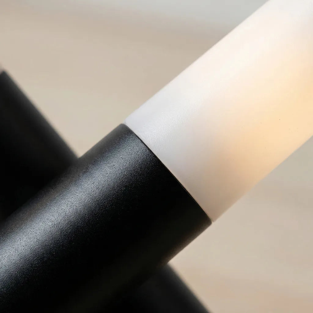Stylish black Trivela desk lamp, modern design with three adjustable LED lights, perfect for night reading