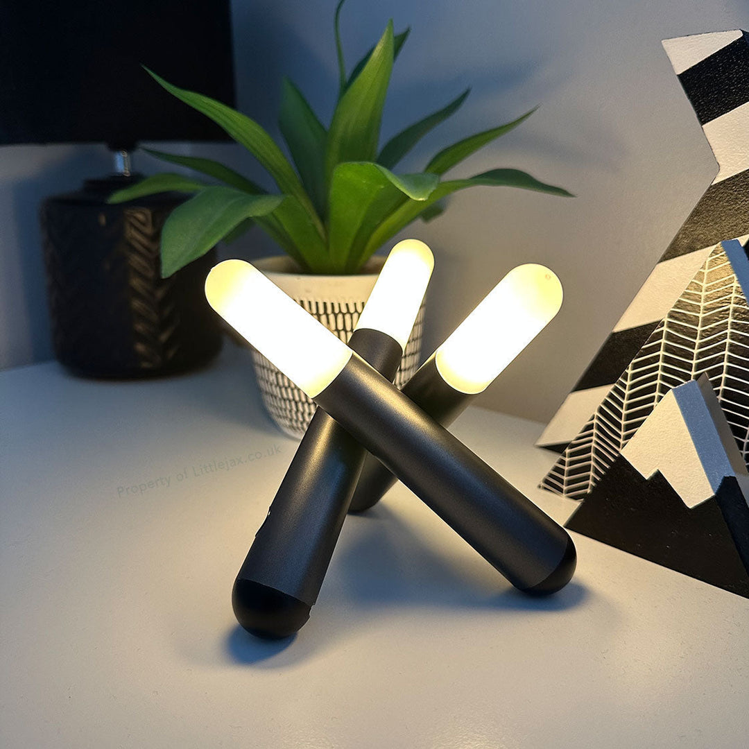 White Modern Adjustable Three Head Table Lamp, Trivela, casting a warm glow, versatile desk or night light