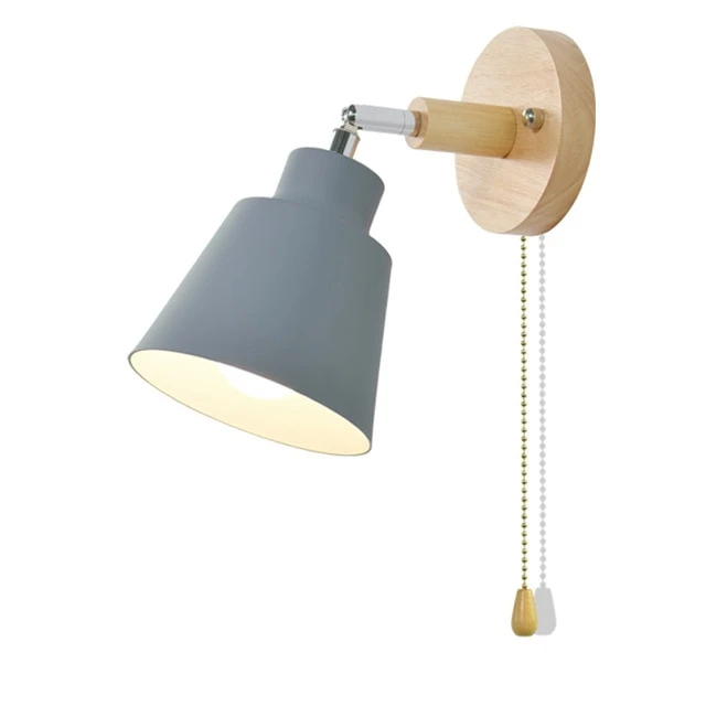 TwistGlow adjustable wall lamp with pull chain switch, enhancing home decor in bedrooms and living rooms.
