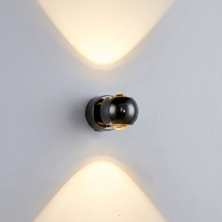 Close-up of a modern decorative wall fixture, Glintara adjustable warm LED lamp