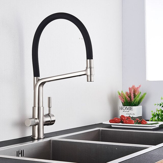 Sleek PureFlow Duo kitchen tap featuring a double spout and built-in water filtration system.