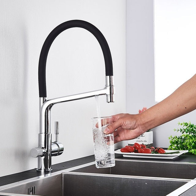 Stylish modern kitchen faucet in brass, offering a dual outlet for pure, filtered water.
