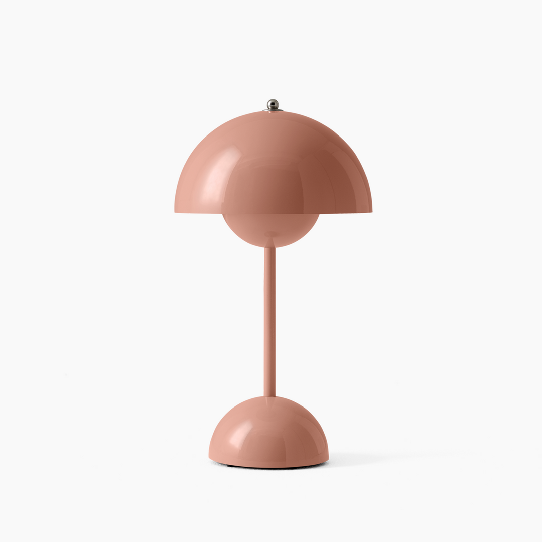 Modern dimmable LED table lamp. Rechargeable wireless design for home & office decor, providing ambient lighting.