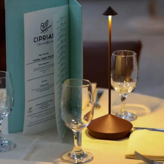 Contemporary wireless LED table lamp, dimmable, suitable for both home & patio lighting.