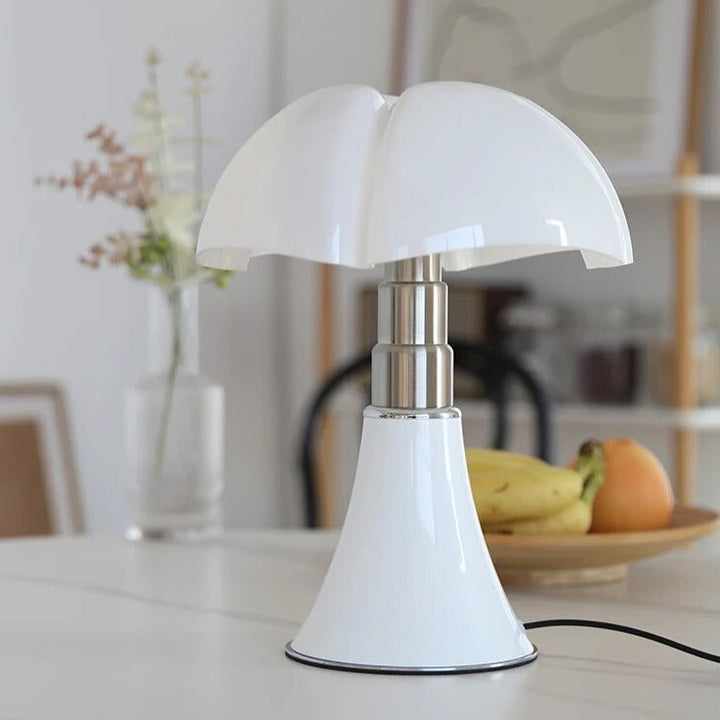 Dimmable LED flower table lamp, touch-controlled modern lighting ideal for a bedside or desk.