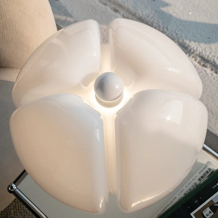 Bedroom LED flower table lamp, dimmable accent light for a modern nightstand or study desk.