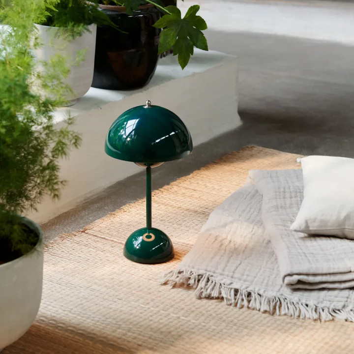 Adjustable LED desk lamp, dimmable with touch control, showcasing warm light.