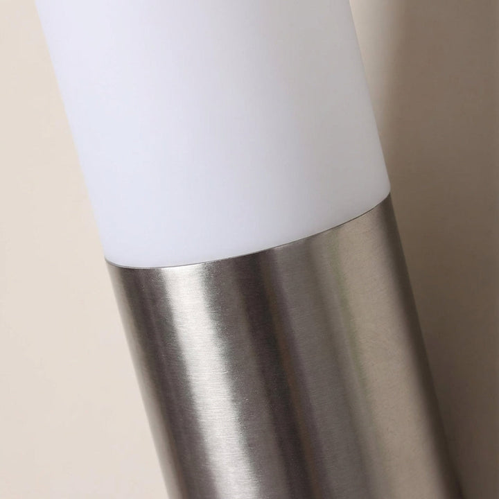Weatherproof LED wall sconce, modern design, black, perfect for outdoor home lighting.