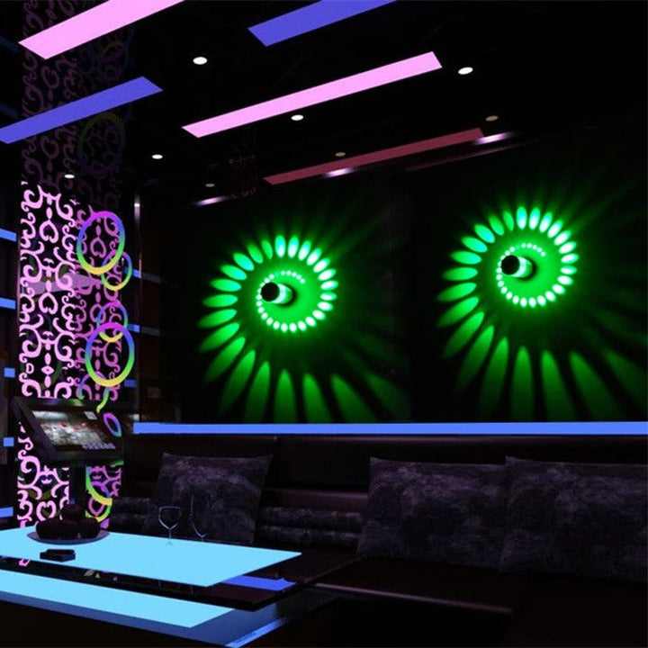 LumoSpiral LED spiral wall lamp providing ambient lighting in a minimalist living space