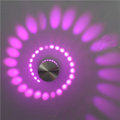 Innovative LumoSpiral LED spiral lamp, creating a cozy and stylish ambiance on a light wall