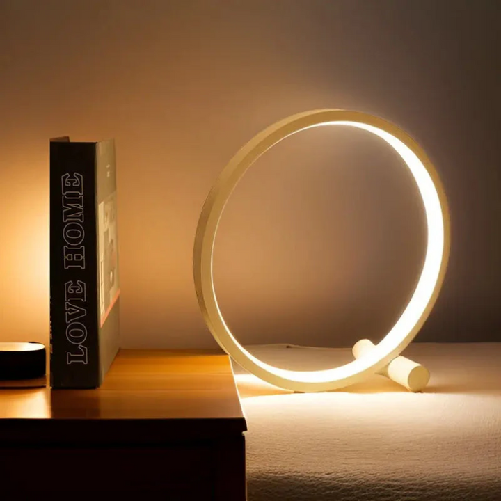Minimalist LumaCircle LED table lamp with dimmable light for modern home decor. Perfect ambient night light.