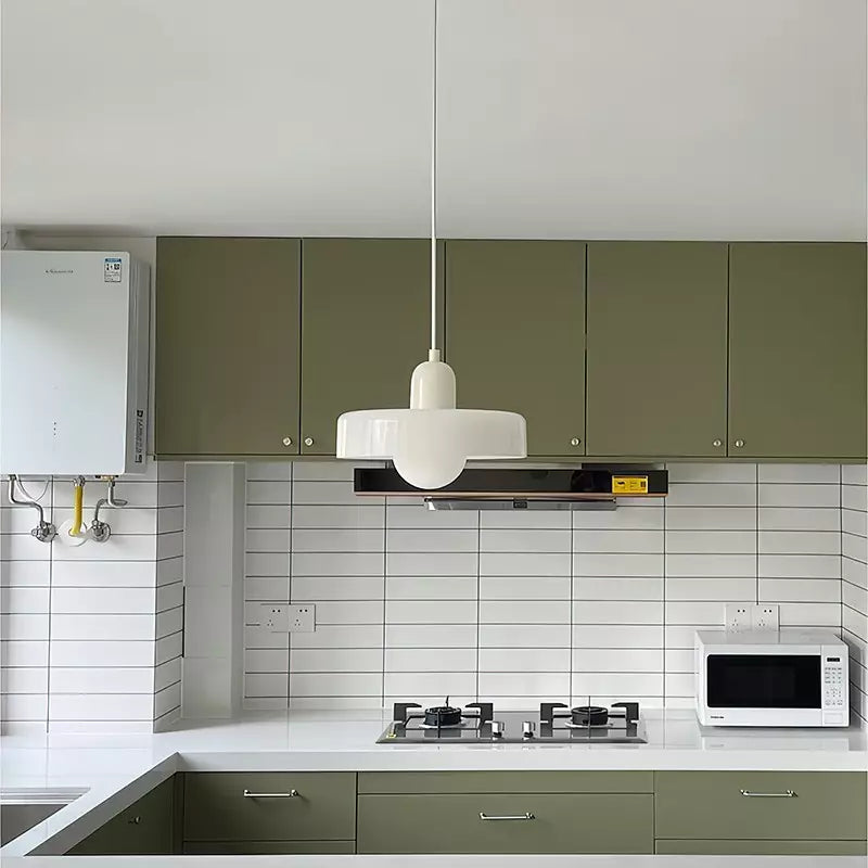 NordicLuxe Scandinavian pendant, clear glass, brightens dining room.