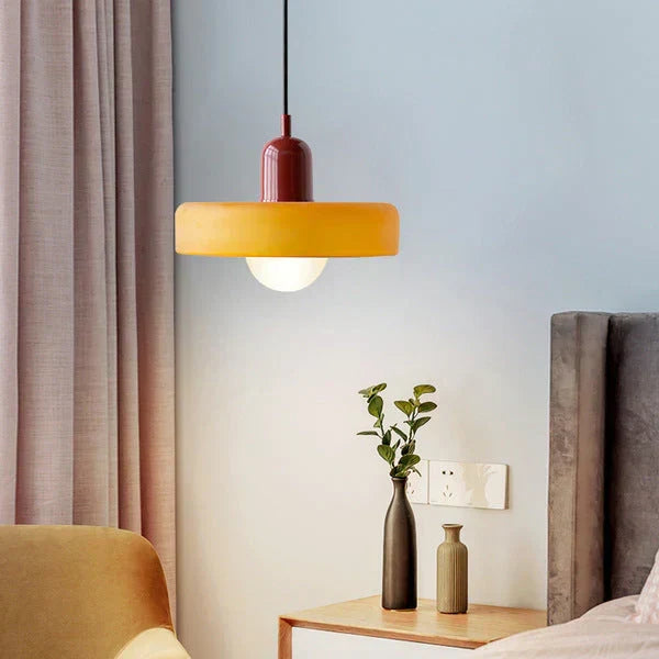 NordicLuxe modern pendant, clear glass globe, ideal for a chic bedroom.