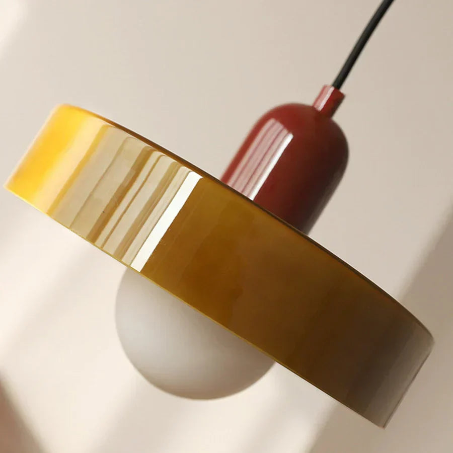 Sleek glass pendant, black finish, ideal for a minimalist, modern aesthetic.