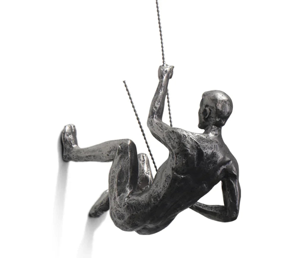 Modern resin climber wall sculpture, unique inspirational home decor art piece for contemporary interiors.