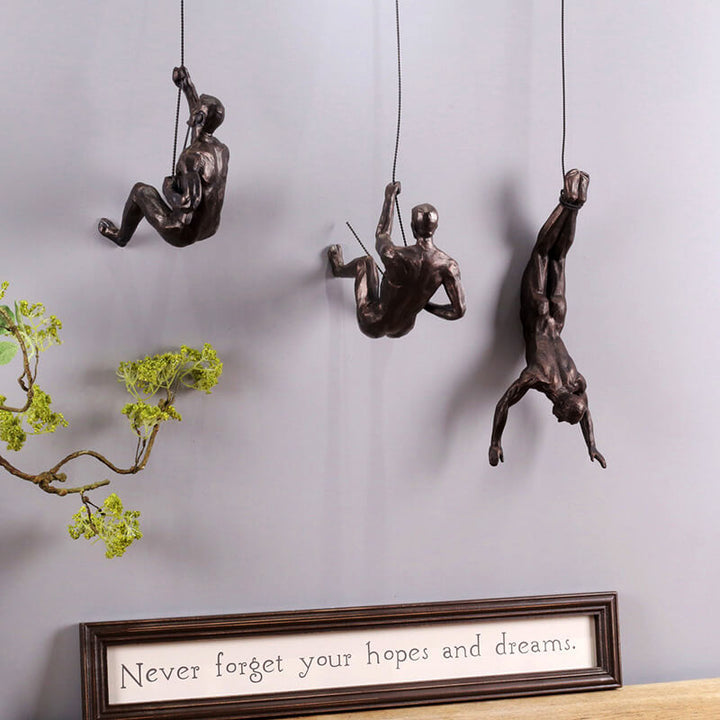 Inspirational climber wall sculpture, unique modern art home decor to uplift any interior space.