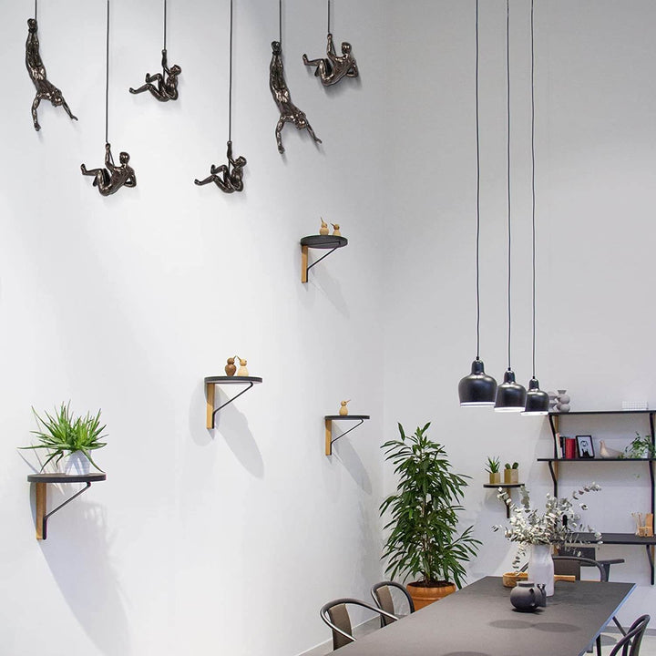 Unique climber wall sculpture, striking modern art decor that inspires and enhances home interiors.