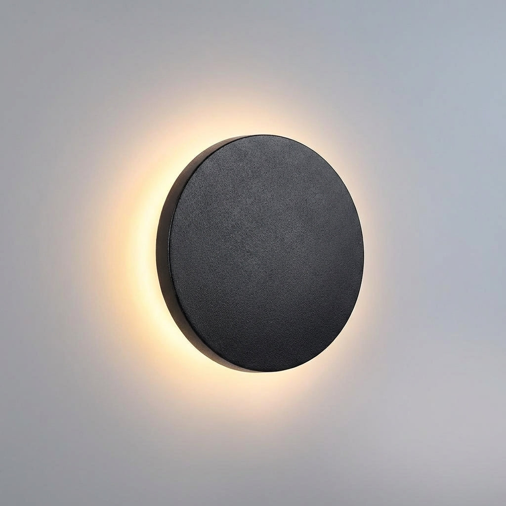 Sleek waterproof Solunex modern round wall light, ideal for garden ambient lighting