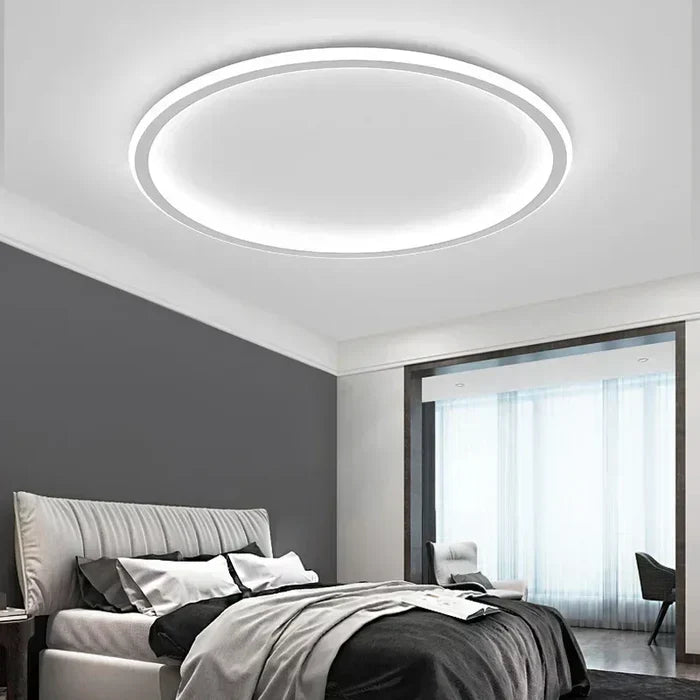 Sleek Scandinavian design round LED ceiling light for living rooms.