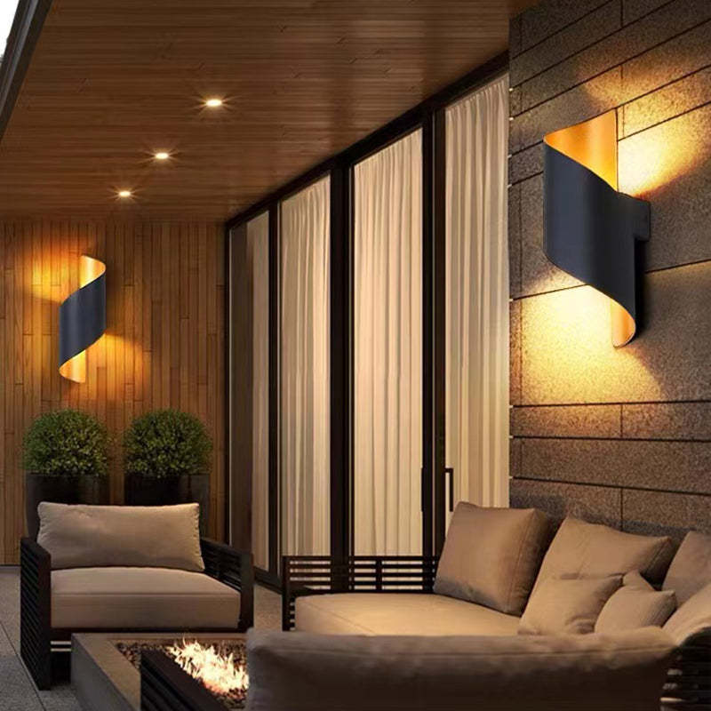 Elegant TwistLight LED wall sconce, spiral design, perfect for outdoor ambiance.