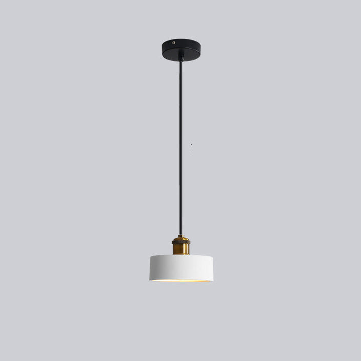 Elegant Morandi LED pendant light, a focal point in a modern dining room.