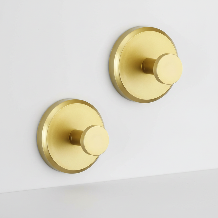 Stylish wall-mounted hooks for bathroom organization, ideal for hanging towels and robes