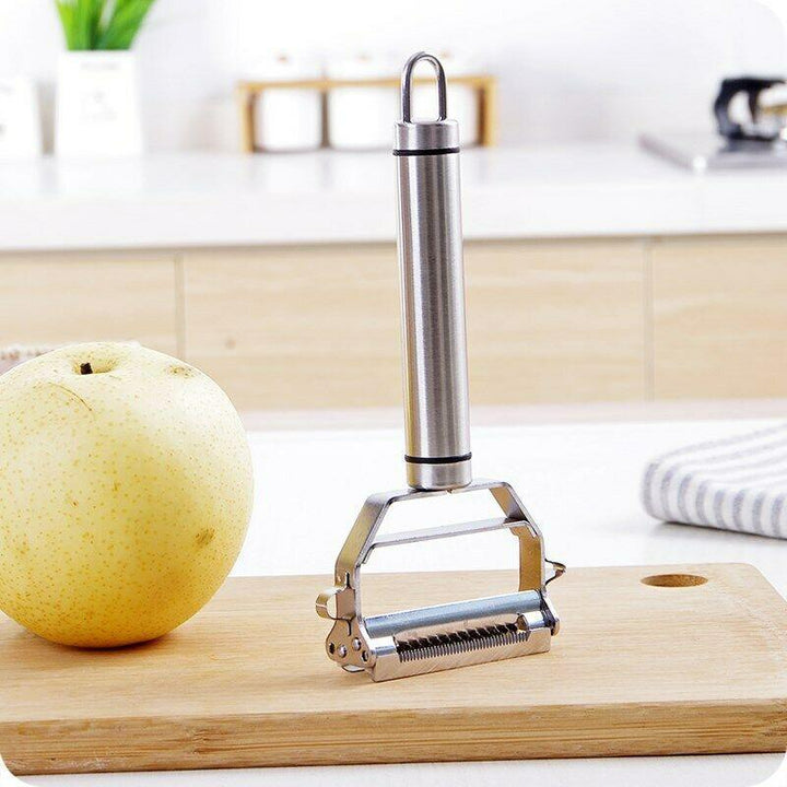 Multifunctional stainless steel vegetable & fruit peeler, an ergonomic kitchen tool for meal prep.