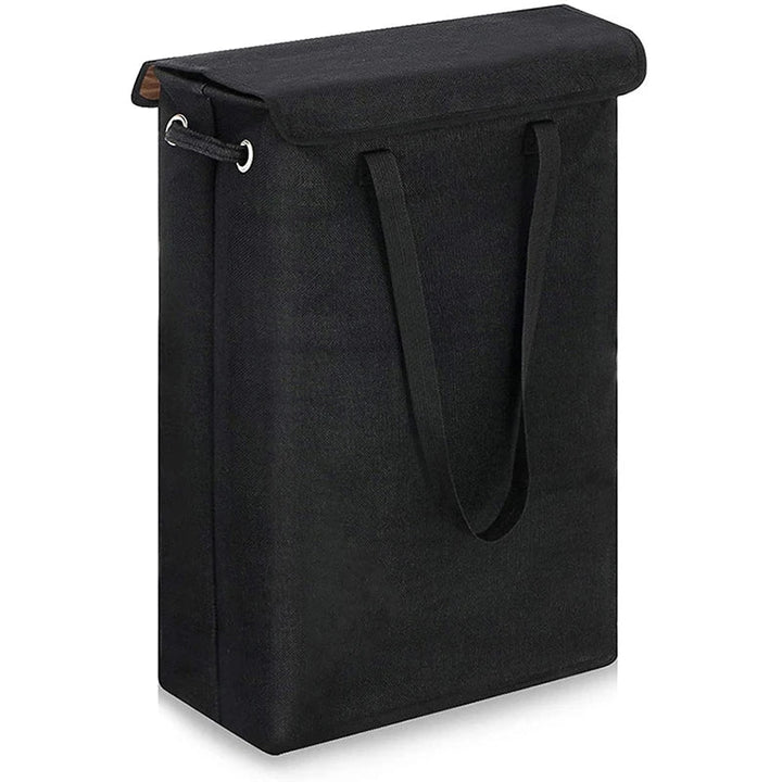 Neris 45L slim laundry hamper with lid tucked between a wall and dryer, illustrating space-saving design